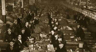 Sorting parcels at the Post Office, Mount Pleasant by English Photographer